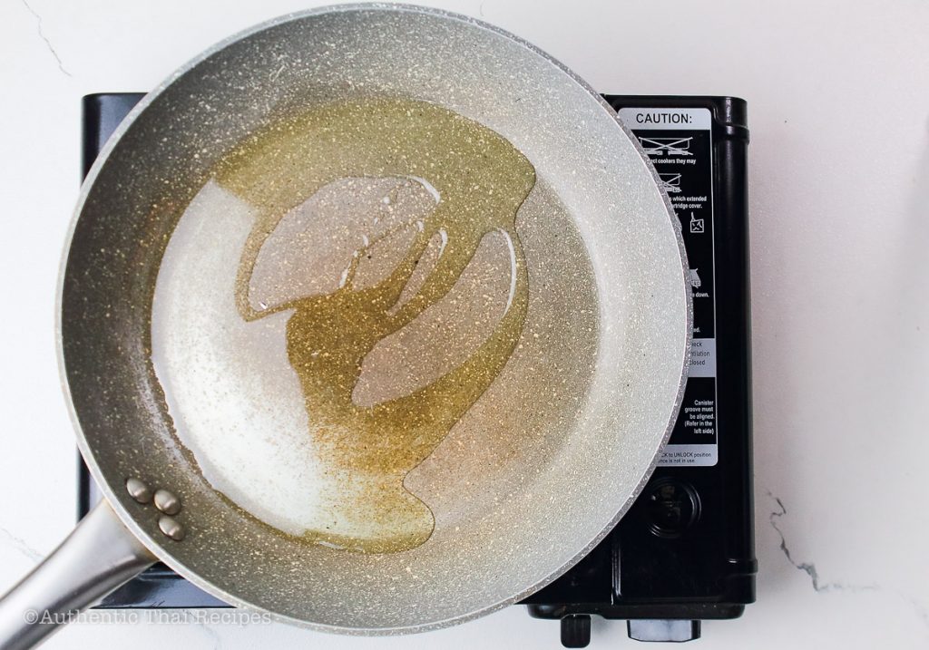 heated oil in a large pan