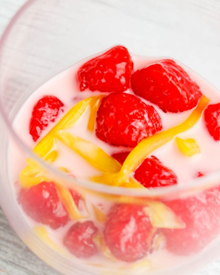 rubies in coconut milk in a transparent bowl