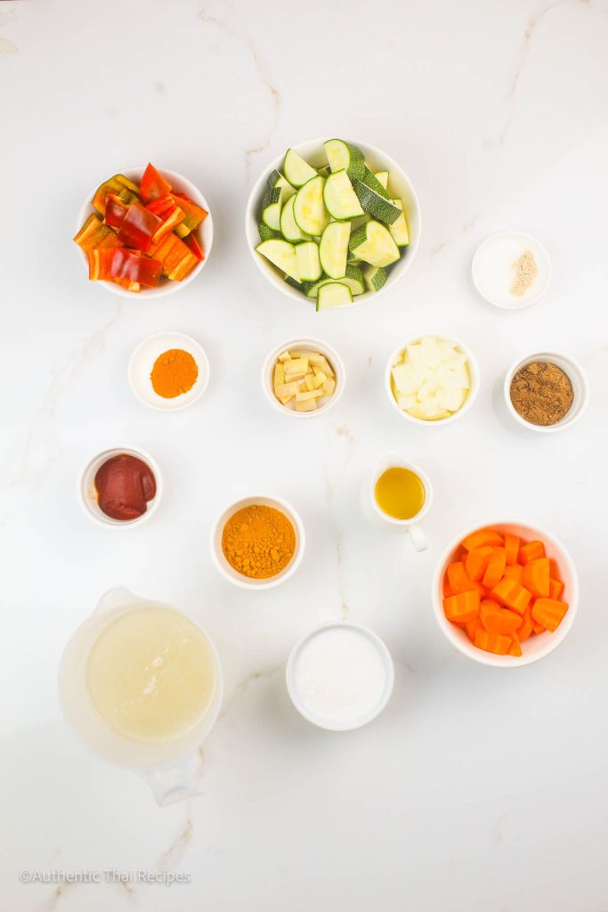 vegan panang curry ingredients on a marble table