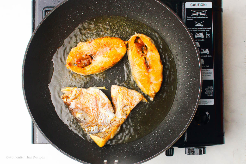 Ingredient Shot Fish frying in a pan