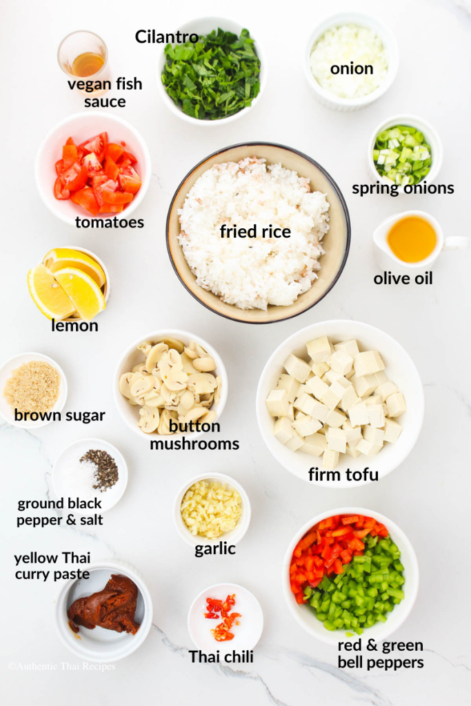 The ingredients in white bowls on a marble table