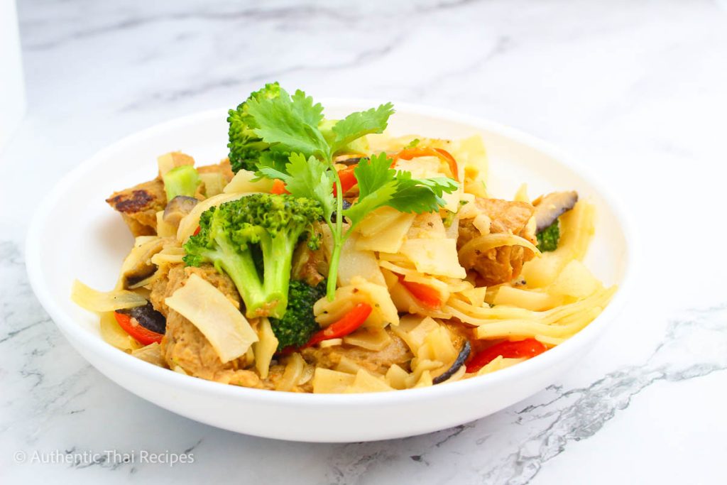 Pad See Ew on a plate topped with broccoli