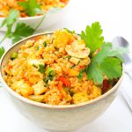 two bowls of Tom Yum Fried Rice on a white table